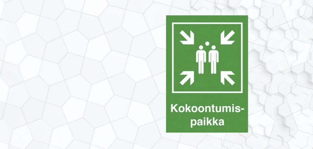 vihreä kyltti joka kertoo kokoontumispaikan